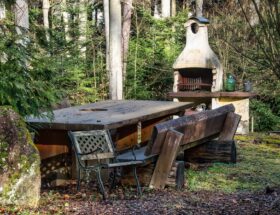 A cozy outdoor seating area with a rustic feel, situated in a Pforzheim garden.