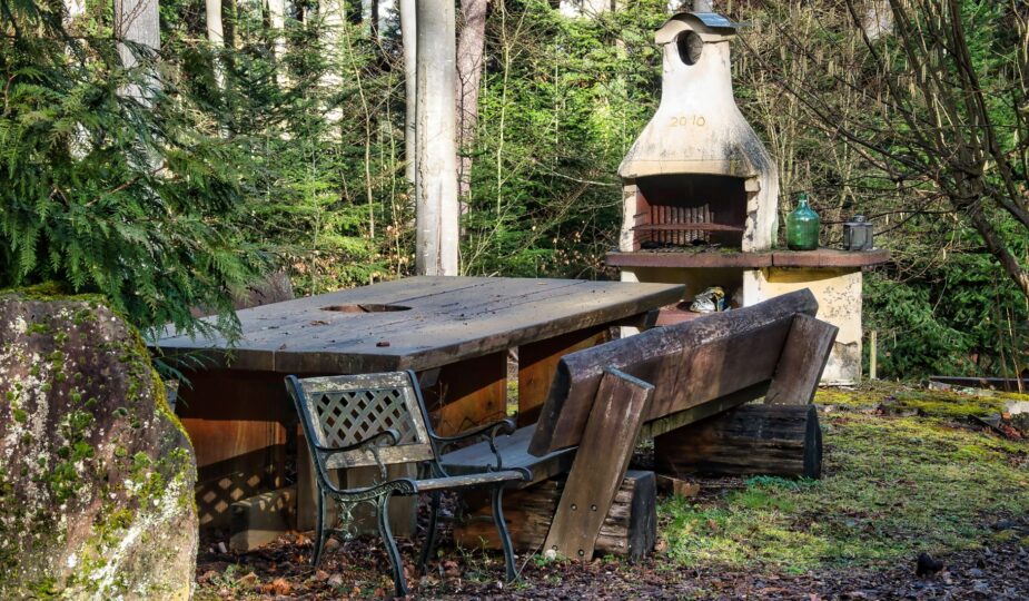A cozy outdoor seating area with a rustic feel, situated in a Pforzheim garden.